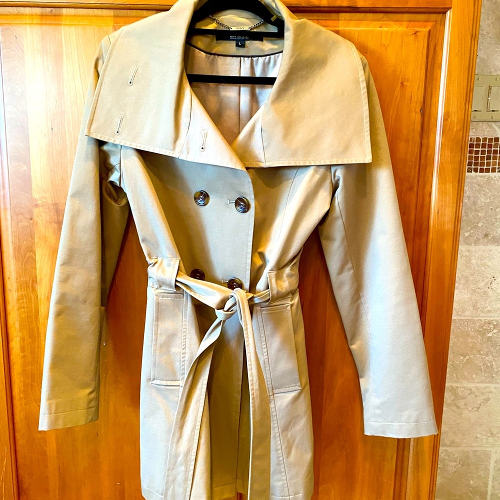DKNY raincoat. Double breasted, knee length, beige, size large.